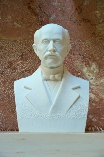 Marble bust of Max Planck with bow tie against a reddish background, Walhalla, Donaustauf,