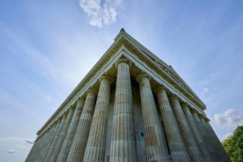 Impressive columned building that stands out against a light-flooded sky, Walhalla, Donaustauf,