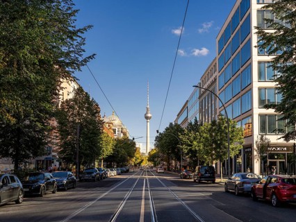 Oranienburger Straße with a view of the television tower at Alexanderplatz, Berlin, Germany