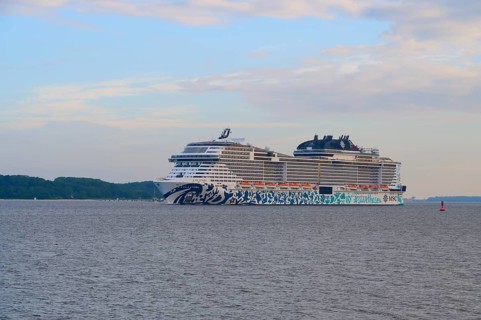 A cruise ship, MSC Euribia, sailing close to the coast across the calm sea, Heikendorf, Plön