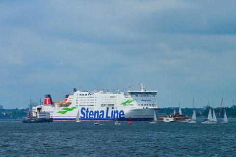 Stena Line ferry on the sea with sailing boats in the surroundings and a cloudy sky, Windjammer