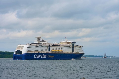 Large cruise ship under a cloudy sky on the open sea, Windjammer Parade Kiel 2025, Heikendorf, Plön