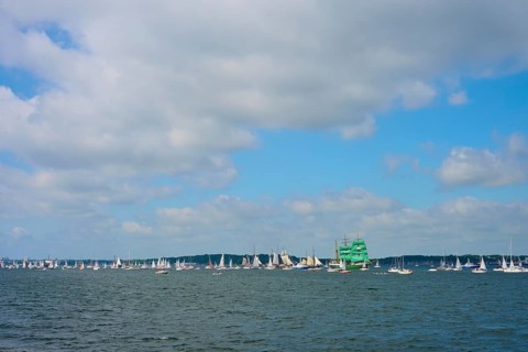 Regatta of sailing boats on the ocean on a cloudy day, Windjammer Parade Kiel 2025, Heikendorf,