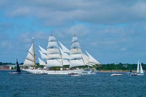 An impressive tall ship Gorch Fock with white sails off the coast, Windjammer Parade Kiel 2025,