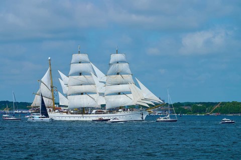A large sailing ship Gorch Fock with white sails on the water, Windjammer Parade Kiel 2025,
