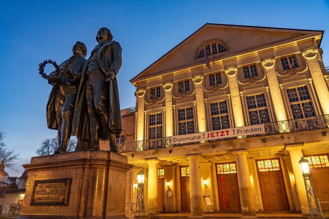 The German National Theatre with the Goethe and Schiller Monument at dusk, Weimar, Thuringia,