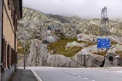 Road junction at the top of the Gotthard Pass, junction to Milan and Bellinzona and to Lucerne and