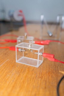 A simple circuit with LEDs in a transparent housing on a table, Youth Research Centre