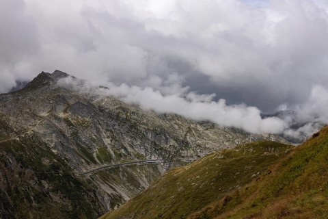 Clouds and view of Gotthard pass road, Passo Scimfuss, Ticino, Switzerland