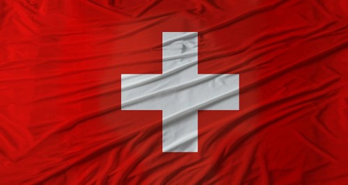 Swiss flag waving. Flag of Switzerland with cloth texture