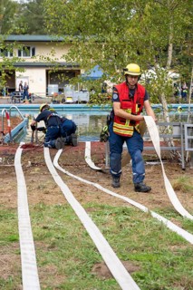 Emergency services practise the use of pumps that are used, for example, during floods, at an old