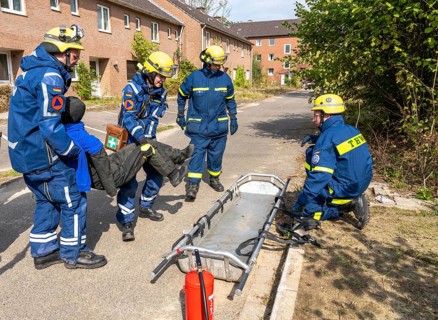 Rescue of people from a car that has crashed into a house, large-scale exercise FÜLEX25, of the