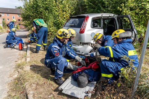 Rescue of people from a car that has crashed into a house, large-scale exercise FÜLEX25, of the