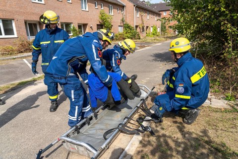 Rescue of people from a car that has crashed into a house, large-scale exercise FÜLEX25, of the