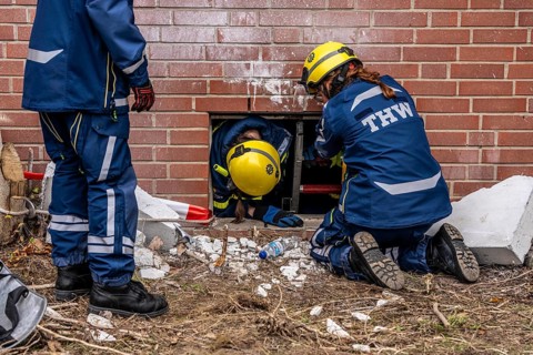 Rescue and recovery of people after a drone attack on a residential building in a civil defence
