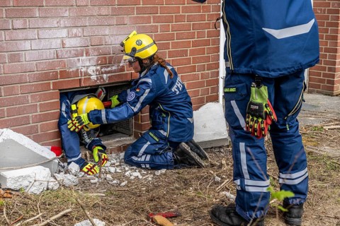 Rescue and recovery of people after a drone attack on a residential building in a civil defence