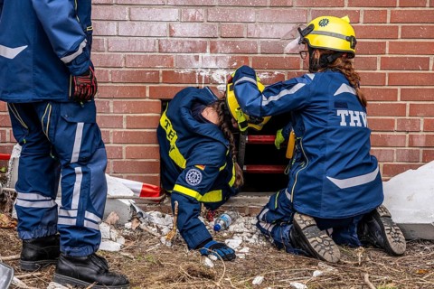 Rescue and recovery of people after a drone attack on a residential building in a civil defence