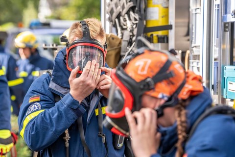 Civil defence exercise scenario, after a drone attack on a residential area, emergency services