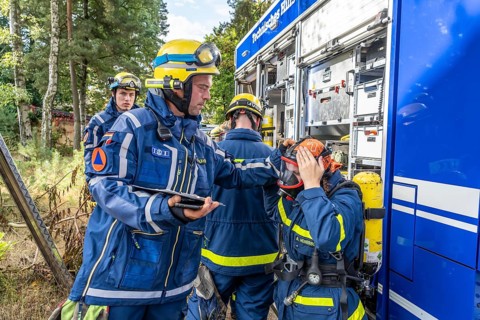 Civil defence exercise scenario, after a drone attack on a residential area, emergency services