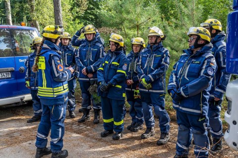 Civil defence exercise scenario, after a drone attack on a residential area, emergency services