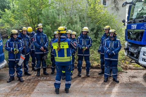 Civil defence exercise scenario, after a drone attack on a residential area, emergency services