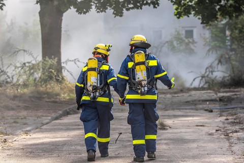 Civil defence exercise scenario, after a drone attack on a residential area, emergency services