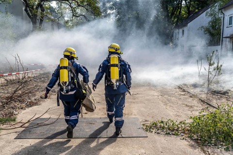 Civil defence exercise scenario, after a drone attack on a residential area, emergency services