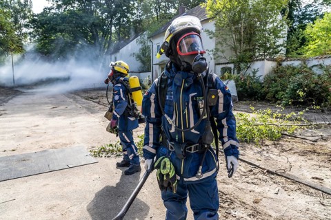 Civil defence exercise scenario, after a drone attack on a residential area, emergency services