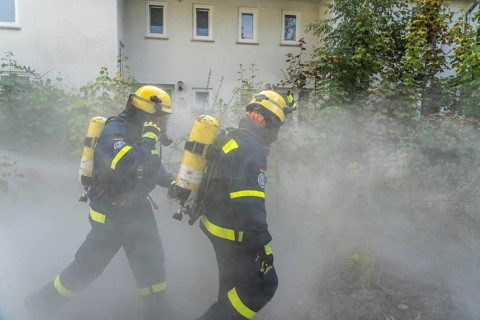 Civil defence exercise scenario, after a drone attack on a residential area, emergency services