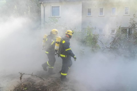 Civil defence exercise scenario, after a drone attack on a residential area, emergency services