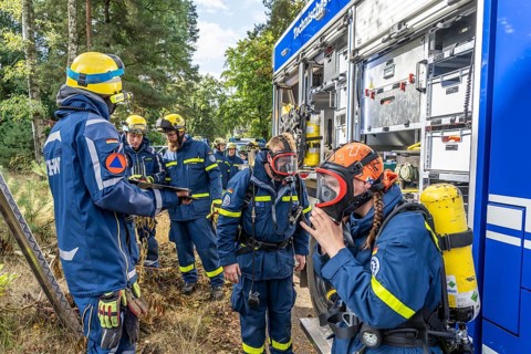Civil defence exercise scenario, after a drone attack on a residential area, emergency services