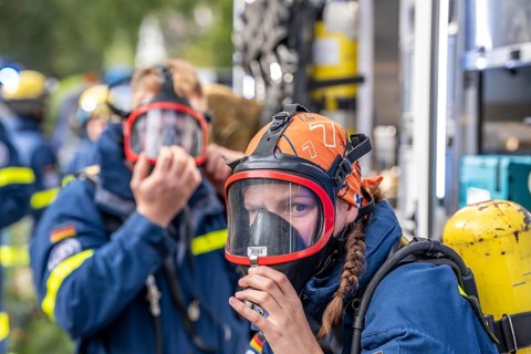 Civil defence exercise scenario, after a drone attack on a residential area, emergency services