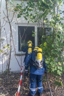 Civil defence exercise scenario, after a drone attack on a residential area, emergency services