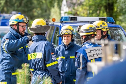 Civil defence exercise scenario, after a drone attack on a residential area, emergency services