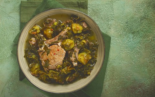 Chakapuli, Georgian dish, stewed meat with herbs and tkemali, in white wine, homemade, no people