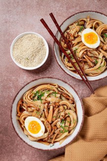 Buckwheat noodles soba with shimeji mushrooms, with boiled egg, green onion, sesame seeds,