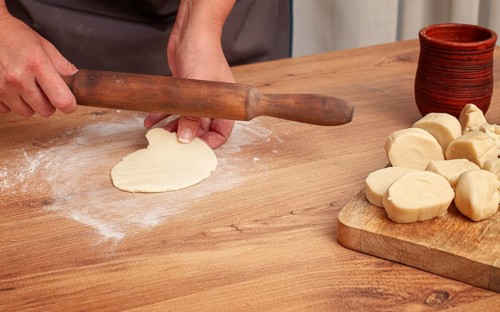 Gyoza dough preparation, in a kitchen setting, gyoza Japanese dumplings, top view, selective focus