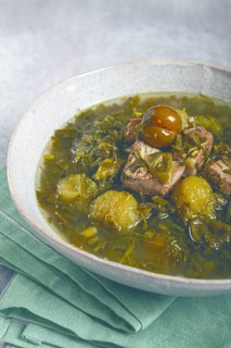 Chakapuli, Georgian dish, stewed meat with herbs and tkemali, in white wine, homemade, no people