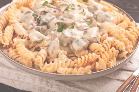 Fusilli pasta, with champignons in creamy garlic sauce, with herbs and spices, sauce, no people
