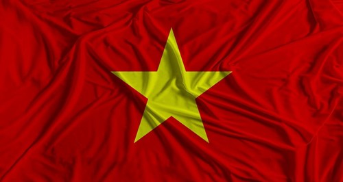 Vietnamese flag with fabric texture background. National flag of Vietnam
