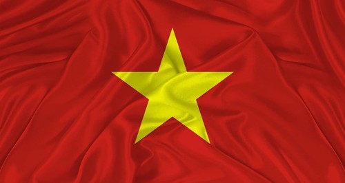 Flag of Vietnam with cloth texture. Close up of Vietnam flag waving