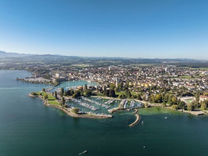 Harbour area, ferry port, yacht harbour, marina of the city of Romanshorn with Seepark, aerial