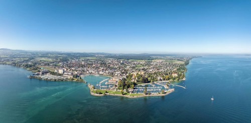 Harbour area, ferry port, yacht harbour, marina of the town of Romanshorn with Seepark, far left