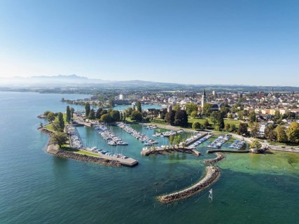 Harbour area, ferry port, yacht harbour, marina of the town of Romanshorn with Seepark, on the left