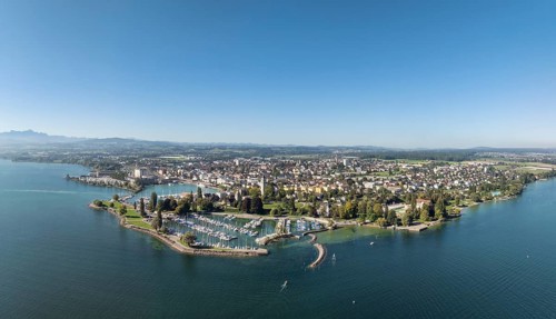 Harbour area, ferry port, yacht harbour, marina of the town of Romanshorn with Seepark, far left