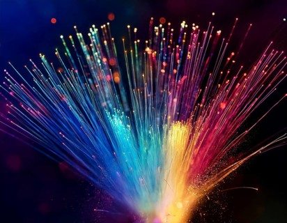 Glowing fiber-optic lights in vivid colors, creating a futuristic and dynamic visual effect, ideal