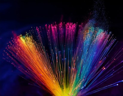 Glowing fiber-optic lights in vivid colors, creating a futuristic and dynamic visual effect, ideal