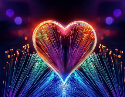 Colorful artistic display featuring vibrant light patterns shaped like a heart, expressing love and
