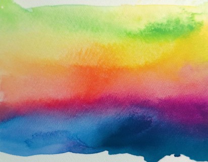 Bright watercolor art showcasing vibrant hues blending with artistic paint splashes, perfect for