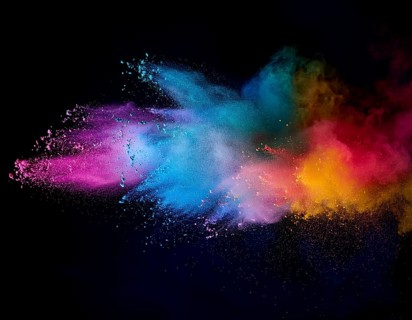 A colorful explosion powder on black background.. Multicolored powder explosion, AI generated